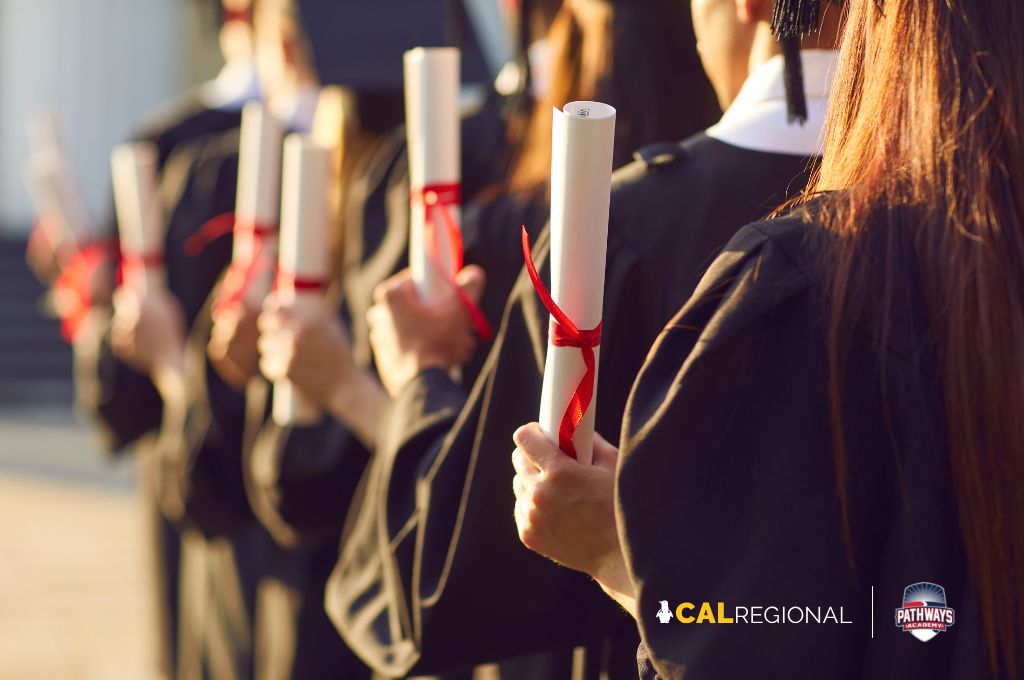 Students in graduation gowns holding diplomas, symbolizing CALRegional and Pathways Academy partnership to earn a free online high school diploma in California