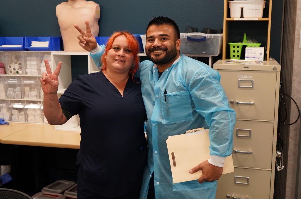 Healthcare students in scrubs during hands-on clinical training at a CALRegional program in San Antonio, TX